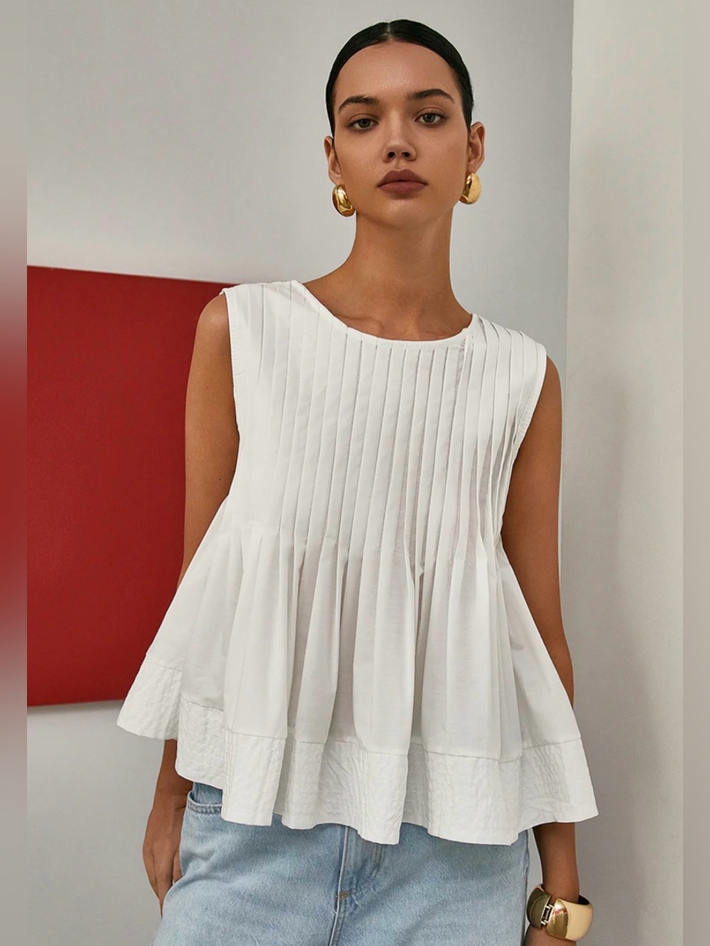Pleated Peplum Sleeveless Blouse